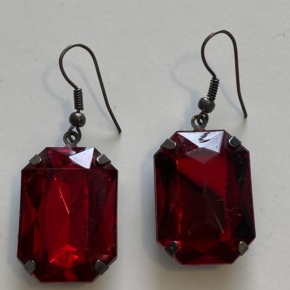 Red “gem stone” style plastic hook earrings